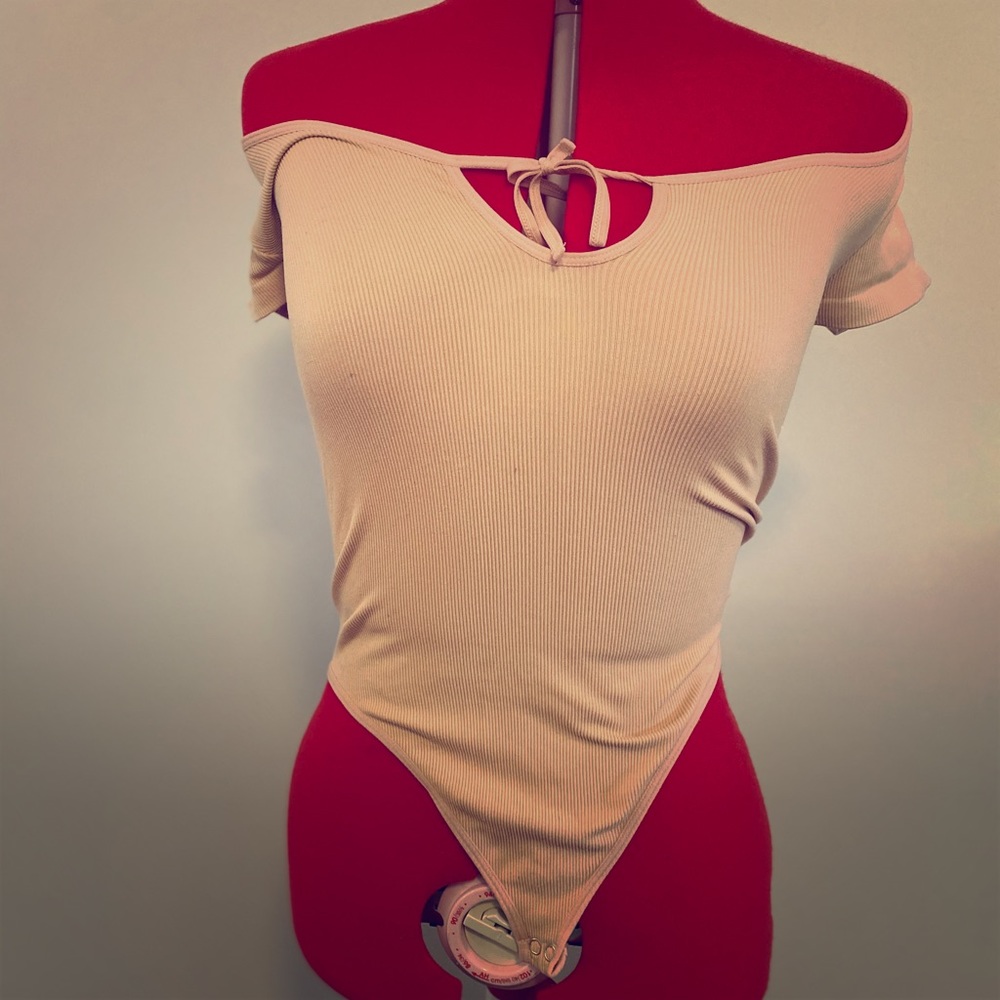 Pink body suit